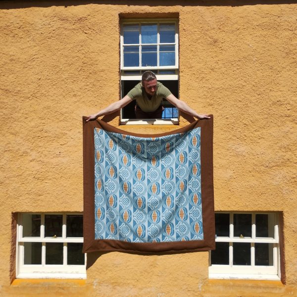 Tudor throw in Blue & Orange